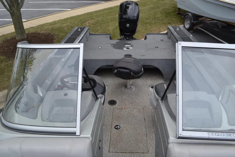 Slide: The Image of 2016 Tracker Targa18Combo boat interior with dual windshields and seating. - 3