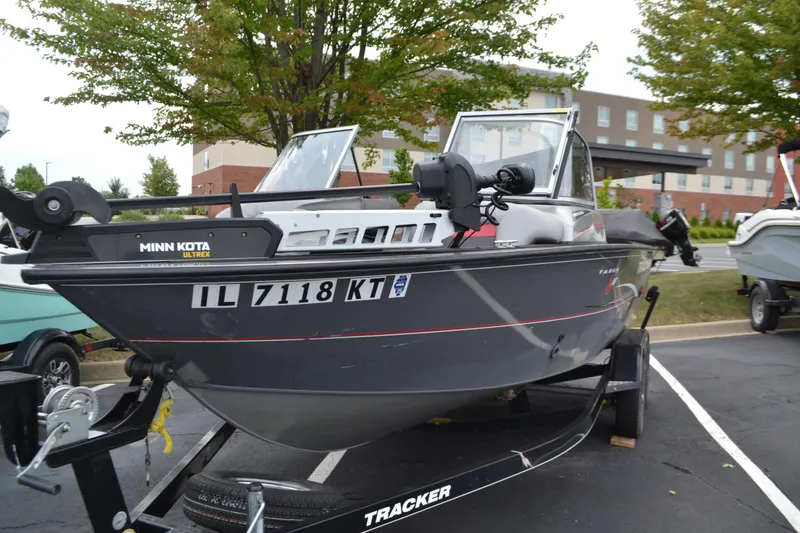 Slide: The Image of 2016 Tracker Targa 18 Combo boat on trailer, featuring Minn Kota Ultrex motor. - 4