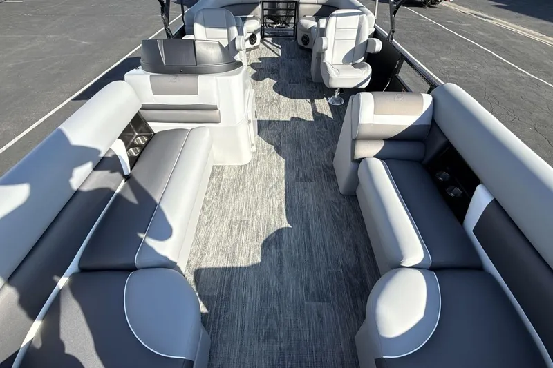 Slide: The Image of 2026 Landau Island Breeze 232 Sport Cruise interior with spacious seating and modern design. - 12