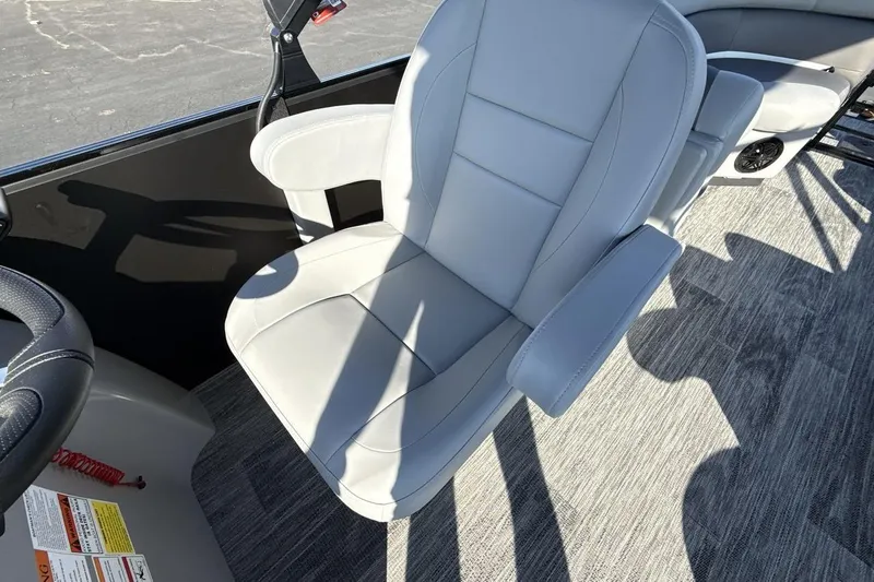 Slide: The Image of 2026 Landau Island Breeze 232 Sport Cruise boat seat, featuring sleek gray upholstery. - 13