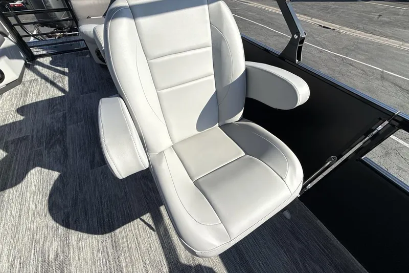Slide: The Image of Luxurious seating on 2026 Landau Island Breeze 232 Sport Cruise boat. - 17