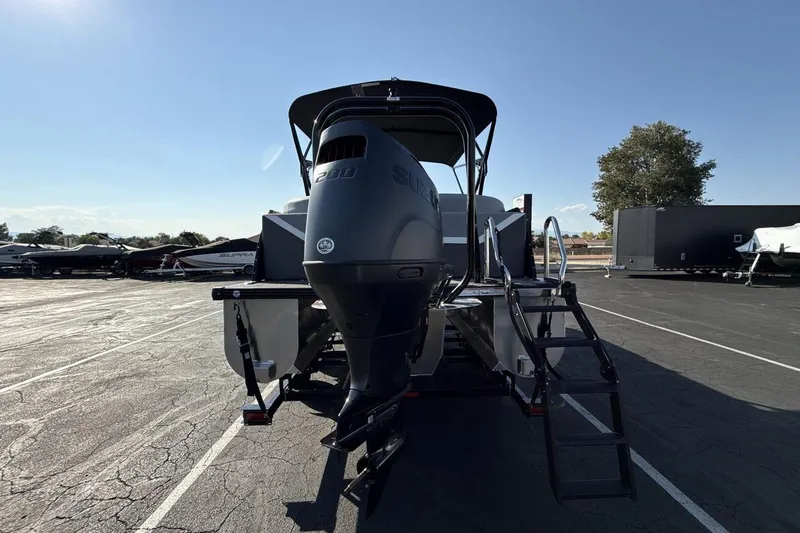 Slide: The Image of 2026 Landau Island Breeze 232 Sport Cruise boat with powerful outboard motor. - 4