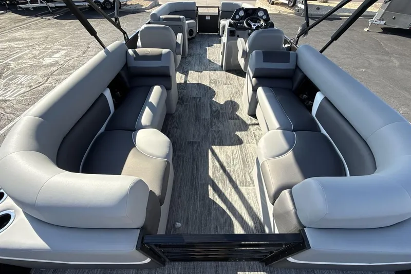 Slide: The Image of 2026 Landau Island Breeze 232 Sport Cruise pontoon boat interior with spacious seating. - 9