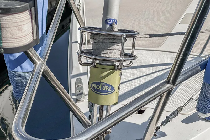 Slide: The Image of Close-up of a 1984 Catalina 30 sailboat's ProFurl system on deck. - 24