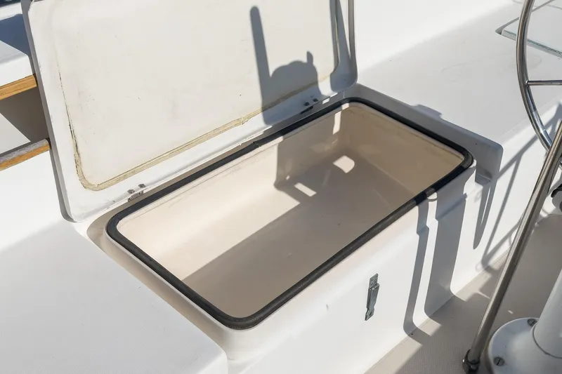 Slide: The Image of Open storage compartment on 1984 Catalina 30 sailboat deck. - 44