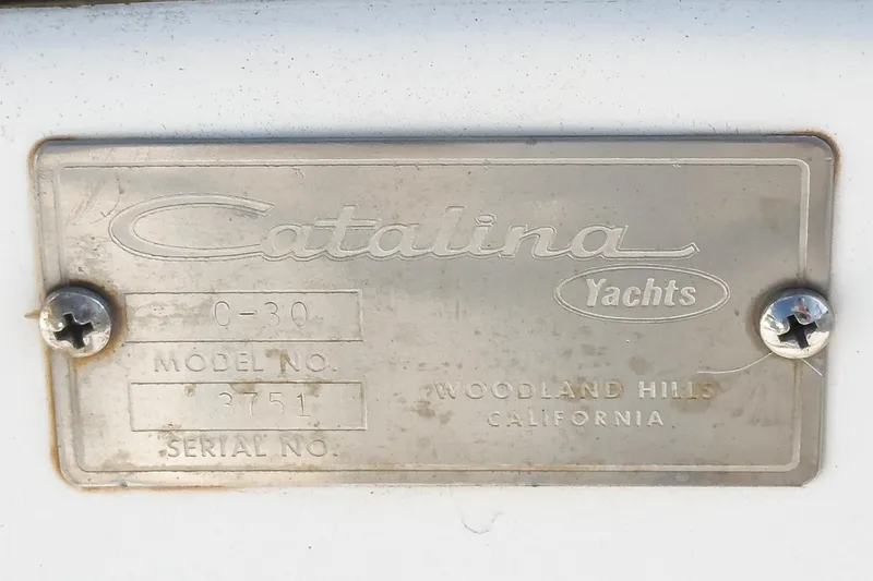 Slide: The Image of Plaque of 1984 Catalina 30 yacht, displaying model and serial numbers. - 46