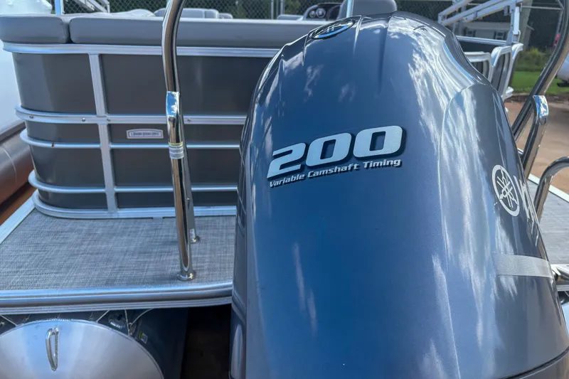 Slide: The Image of 2021 Trifecta 22C CS 2.75 pontoon boat with Yamaha 200 engine. - 4
