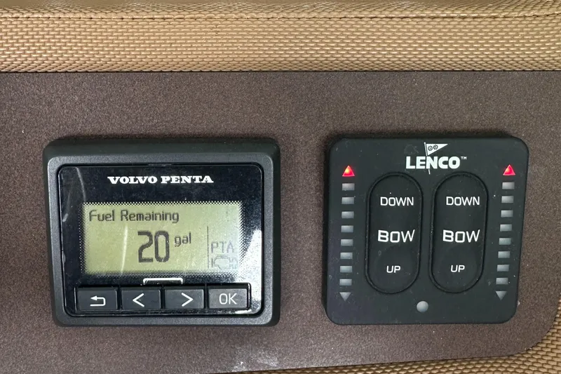 Slide: The Image of Digital fuel gauge and control panel on 2015 Cobalt R7 boat dashboard. - 18
