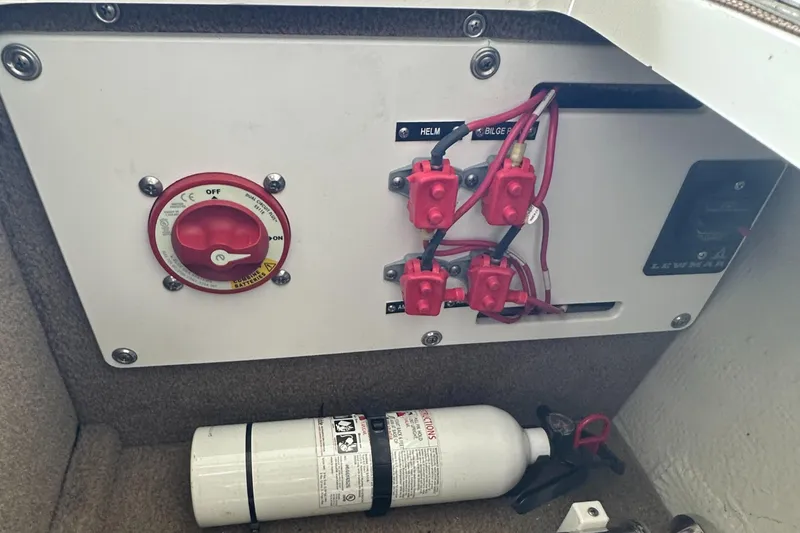 Slide: The Image of Electrical panel and fire extinguisher in 2015 Cobalt R7 boat. - 27