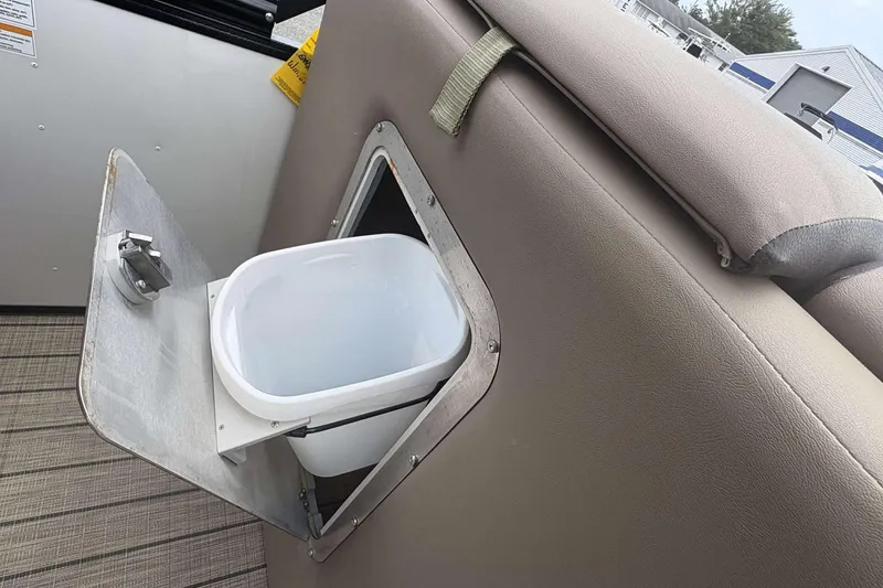 Slide: The Image of 2023 Veranda VTX22RC boat with built-in storage compartment and removable bin. - 22