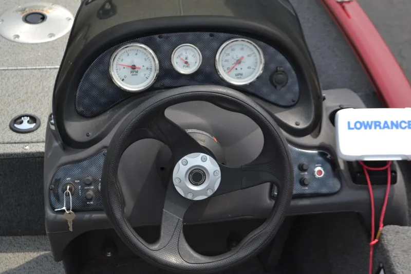 Slide: The Image of 2019 Tracker Super Guide V16 dashboard with steering wheel and gauges. - 3
