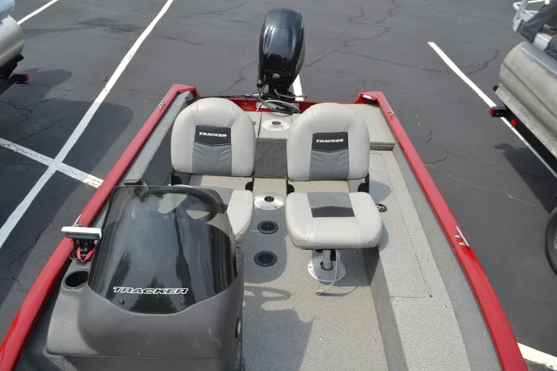 Slide: The Image of 2019 Tracker Super Guide V16 boat with dual seats and steering console. - 5