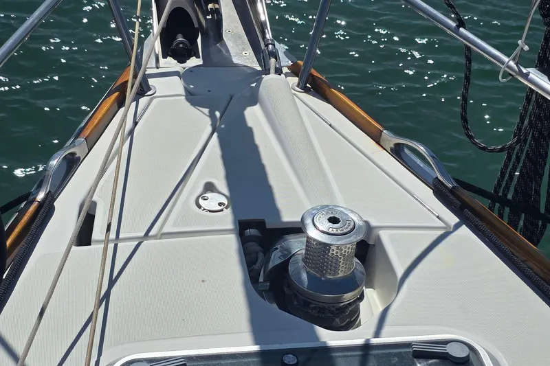 Slide: The Image of Deck of 2007 Jeanneau 49 Performance sailboat with winch and ropes. - 16