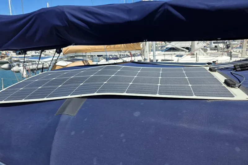 Slide: The Image of Solar panel on 2007 Jeanneau 49 Performance yacht, docked in marina. - 19
