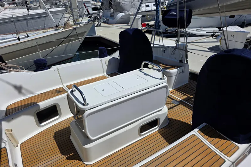 Slide: The Image of 2007 Jeanneau 49 Performance yacht cockpit with teak flooring and covered seating. - 20