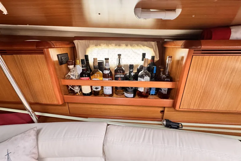 Slide: The Image of Interior of 2007 Jeanneau Sun Odyssey 49 Performance with liquor shelf and wooden cabinetry. - 33