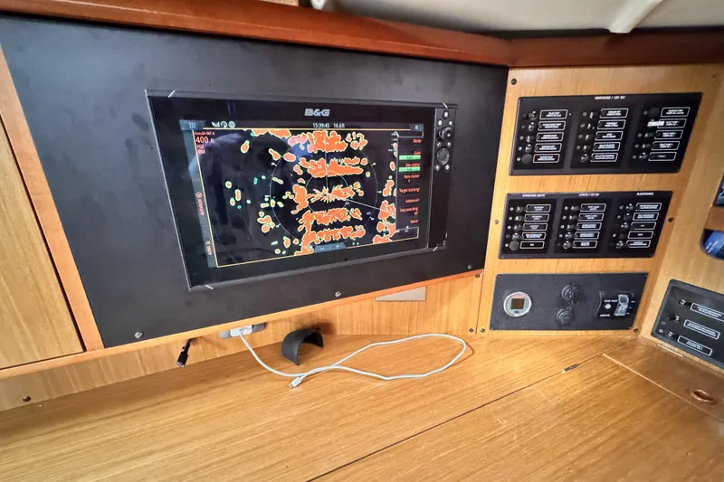 Slide: The Image of Navigation panel of 2007 Jeanneau Sun Odyssey 49 Performance yacht with radar display. - 37