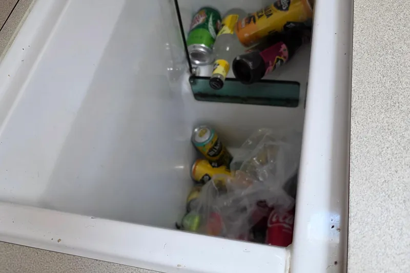 Slide: The Image of Cooler with assorted beverage cans on Jeanneau 49 Performance, 2007 model. - 39