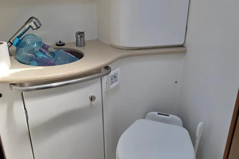 Slide: The Image of 2007 Jeanneau 49 Performance yacht bathroom with sink, faucet, and toilet. - 43