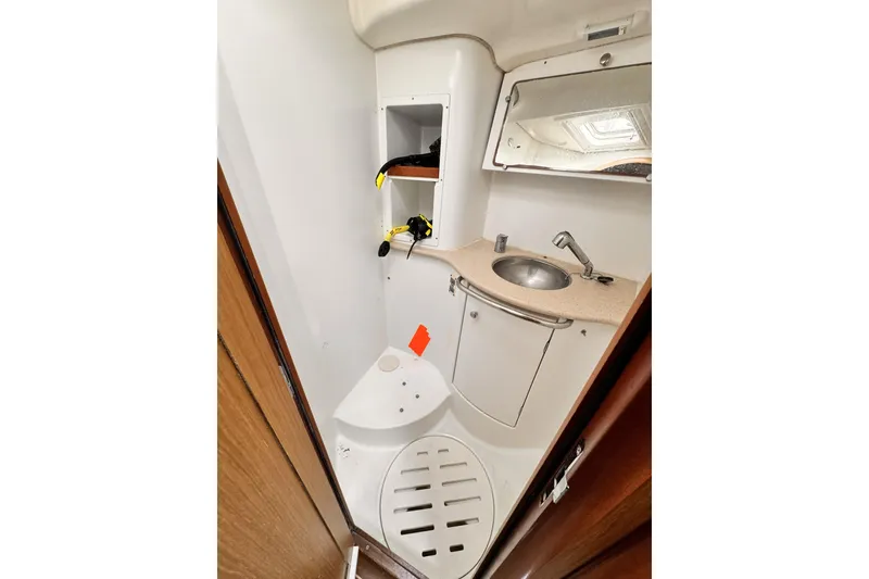 Slide: The Image of Compact bathroom in 2007 Jeanneau Sun Odyssey 49 Performance yacht, featuring sink and storage. - 47