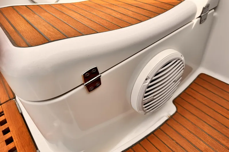 Slide: The Image of Teak deck and speaker on 2007 Jeanneau Sun Odyssey 49 Performance yacht. - 54