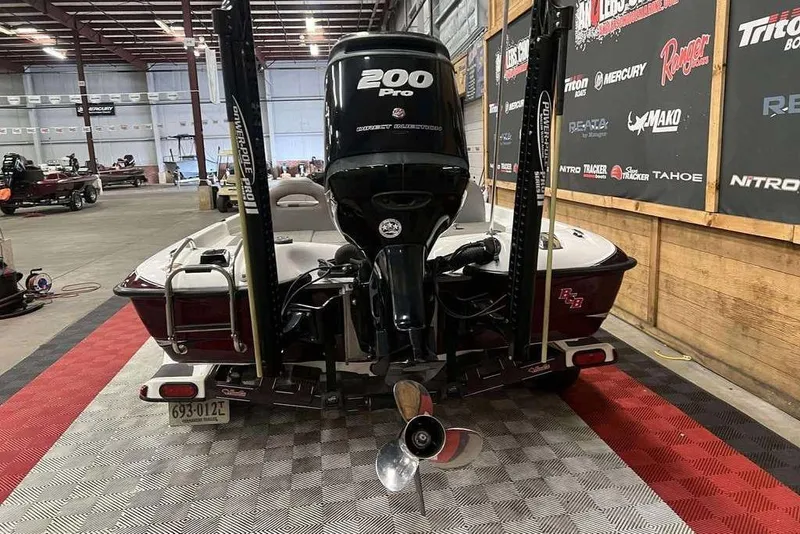 Slide: The Image of 2016 Bass Cat Pantera II boat with 200 Pro motor in showroom. - 3