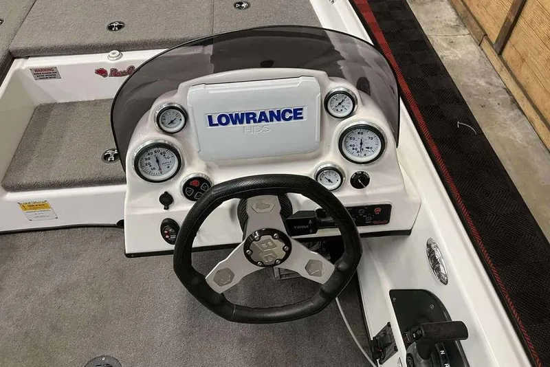 Slide: The Image of 2016 Bass Cat Pantera II boat dashboard with Lowrance HDS system and gauges. - 8