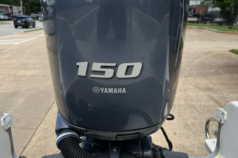 Slide: The Image of Yamaha 150 outboard motor on a 2014 Sea Hunt BX 22 Pro boat. - 23