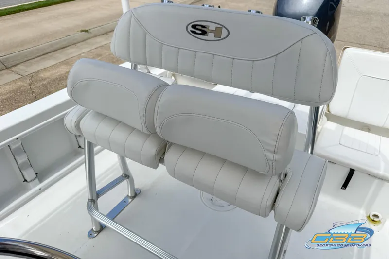 Slide: The Image of 2014 Sea Hunt BX 22 Pro boat seat with white upholstery and SH logo. - 25
