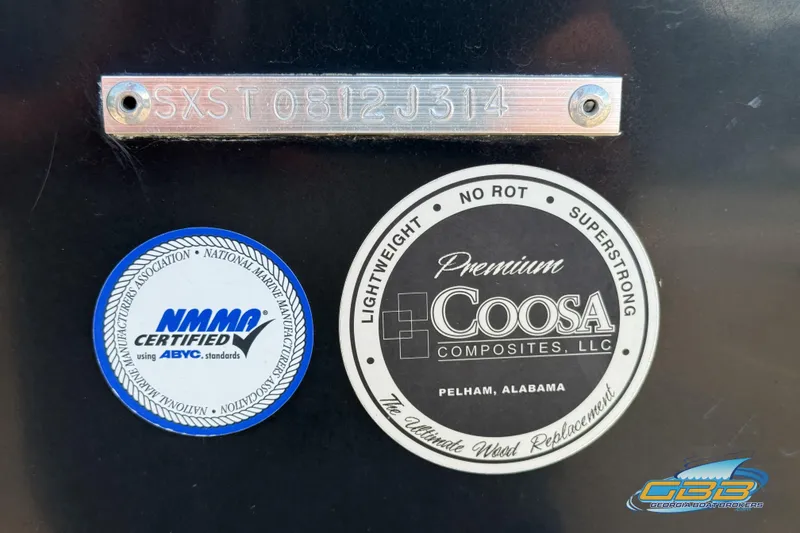 Slide: The Image of 2014 Sea Hunt BX 22 Pro with NMMA and Coosa Composites certification labels. - 32