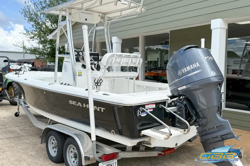 Slide: The Image of 2014 Sea Hunt BX 22 Pro boat with Yamaha 150 engine on trailer. - 6
