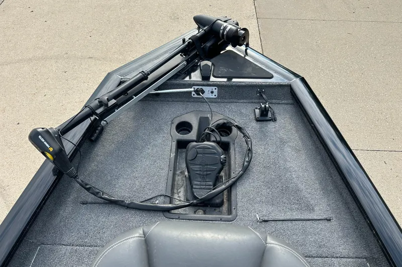 Slide: The Image of 2024 Tracker Pro Team 190 TX boat deck with trolling motor and control panel. - 3