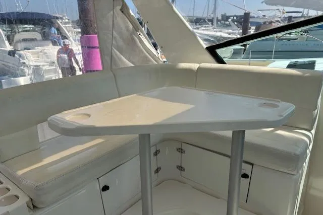 Slide: The Image of Interior of 2000 Tiara Yachts 4100 Open with seating and table. - 7