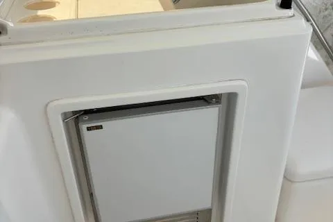 Slide: The Image of 2000 Tiara Yachts 4100 Open interior detail with built-in refrigerator. - 8