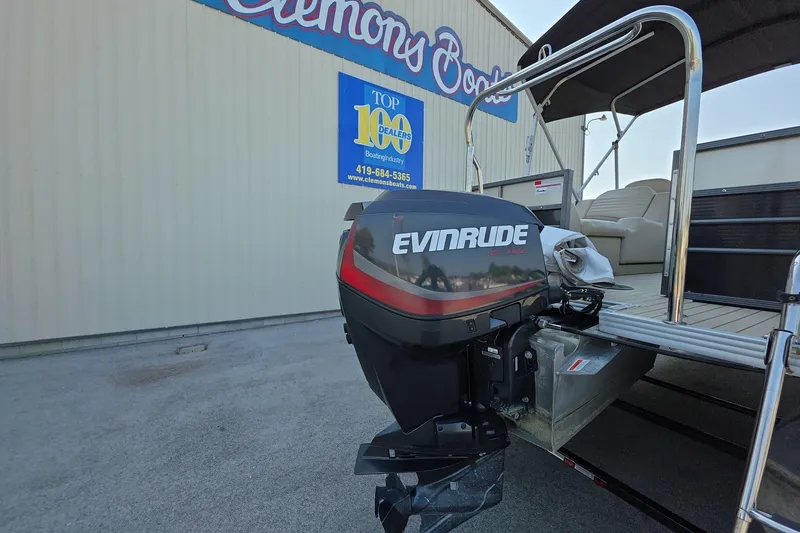 Slide: The Image of 2015 Crest III 230 SL pontoon boat with Evinrude motor at Clemons Boats dealership. - 7