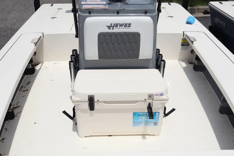 Slide: The Image of 2026 Hewes Redfisher 18 logo on white leather upholstery. - 8