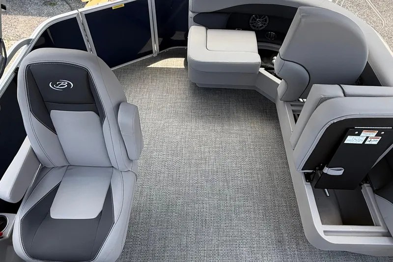 Slide: The Image of 2025 Barletta Aria 20L interior with gray seating and carpeted flooring. - 7