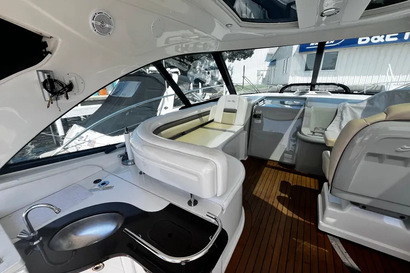 Slide: The Image of Luxurious interior of 2012 Sea Ray 500 Sundancer yacht with sleek design and modern amenities. - 12