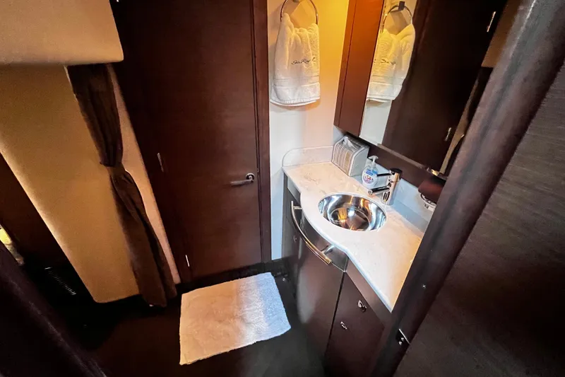 Slide: The Image of Luxurious bathroom interior of 2012 Sea Ray 500 Sundancer yacht with modern amenities. - 30