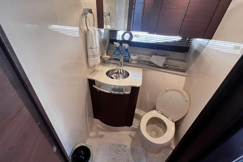 Slide: The Image of Luxurious bathroom in 2012 Sea Ray 500 Sundancer yacht, featuring modern fixtures and elegant design. - 37