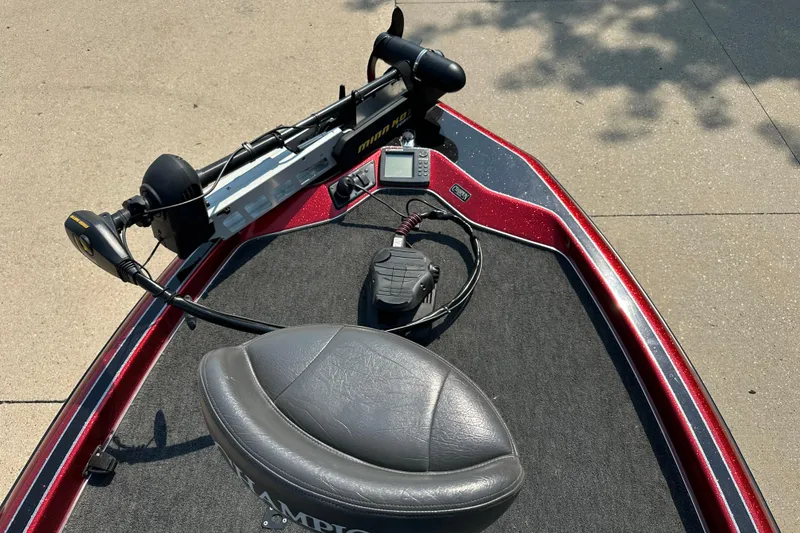 Slide: The Image of 1999 Champion 193 DCX boat deck with trolling motor and seat. - 5