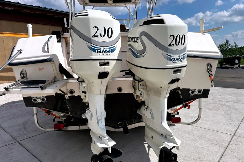 Slide: The Image of 2000 Grady-White Express 265 boat with twin Evinrude 200 outboard engines. - 12