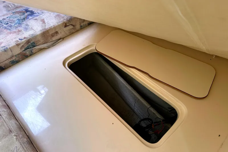 Slide: The Image of Storage compartment in 2000 Grady-White Express 265 boat interior. - 29