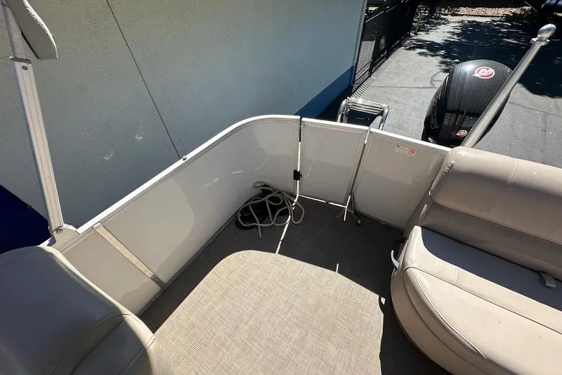 Slide: The Image of 2017 Ranger Reata 220C boat interior with seating and coiled rope. - 23