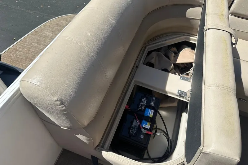 Slide: The Image of 2017 Ranger Reata 220C boat seat storage with battery compartment. - 32