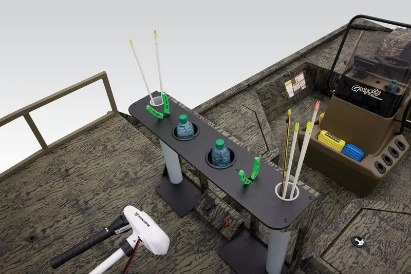 Slide: The Image of 2026 Tracker GRIZZLY® 2072 CC Sportsman boat interior with fishing gear and accessories. - 15