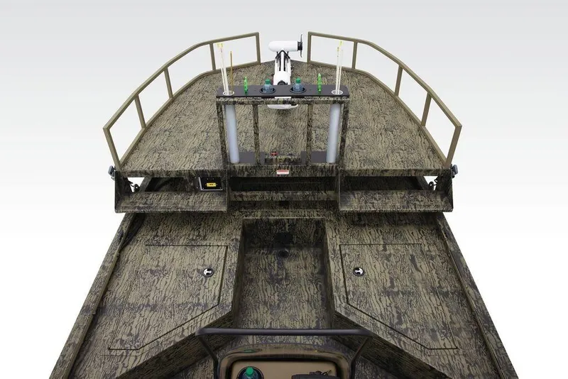 Slide: The Image of 2026 Tracker GRIZZLY® 2072 CC Sportsman boat, camo design, spacious deck, and railing. - 16