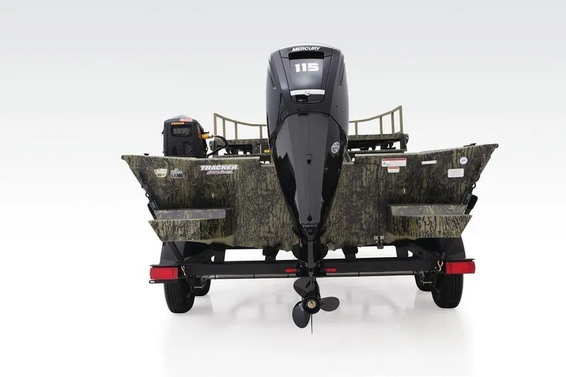 Slide: The Image of 2026 Tracker GRIZZLY® 2072 CC Sportsman boat, rear view with Mercury 115 engine. - 22