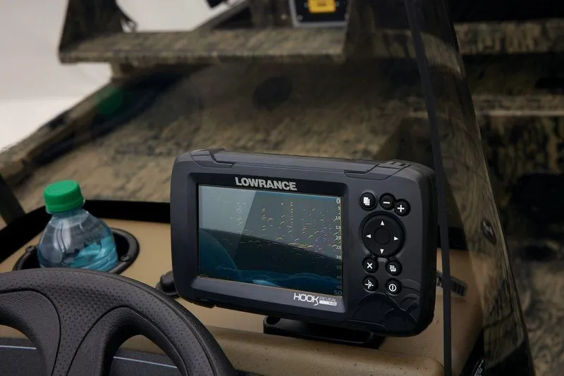 Slide: The Image of Lowrance fish finder on 2026 Tracker GRIZZLY® 2072 CC Sportsman boat dashboard. - 32