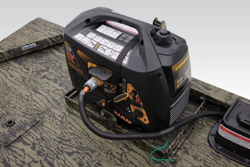 Slide: The Image of 2026 Tracker GRIZZLY® 2072 CC Sportsman boat with onboard generator, camo design. - 38